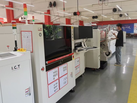 Engineer inspecting equipment functionality at I.C.T headquarters before shipment._main.jpg